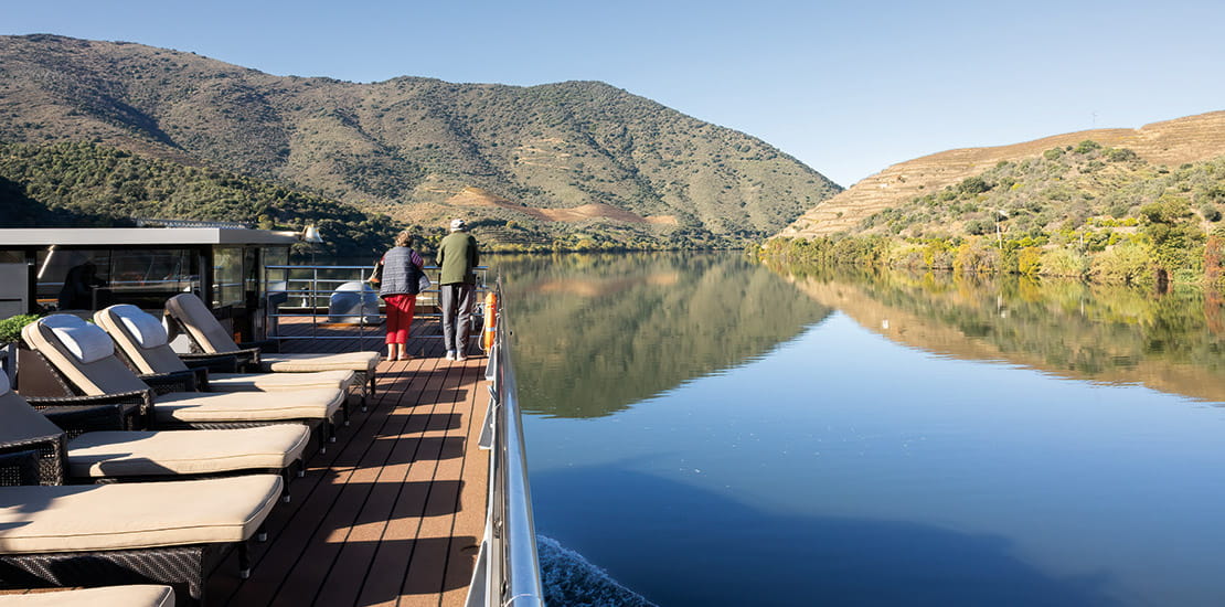 People enjoying the view from the Sun Deck on Douro Serenity